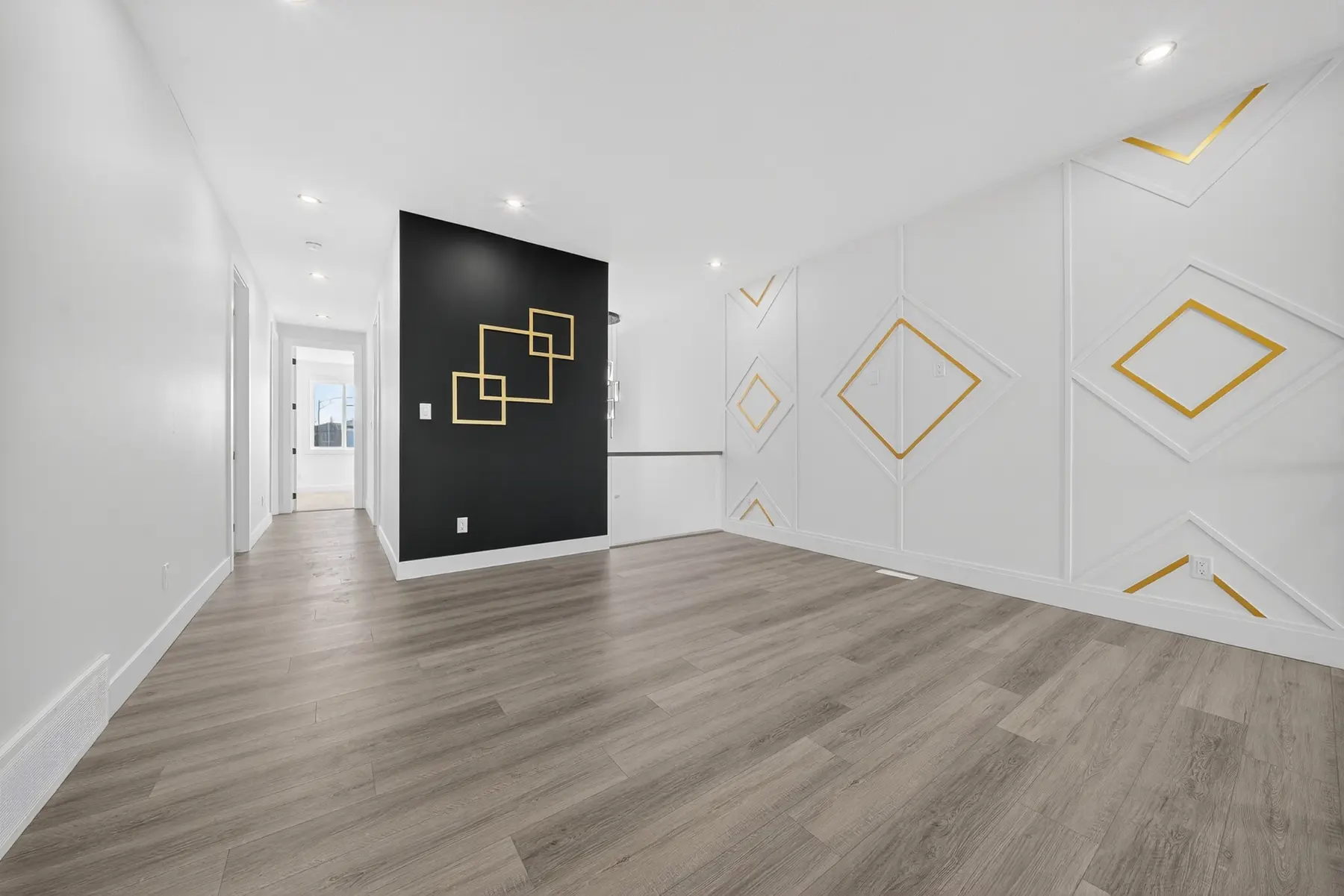 Upper bonus area with geometric feature walls in the Cavanagh residence